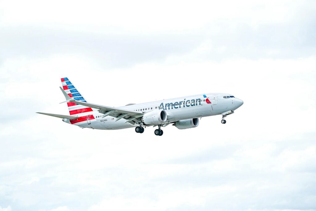 American Airlines Boeing 787 climbing after takeoff under overcast skies