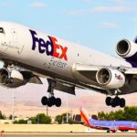 FedEx McDonnell Douglas MD-10-10F cargo aircraft parked on the ramp.